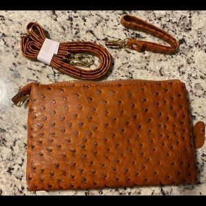 NWT embossed leather clutch